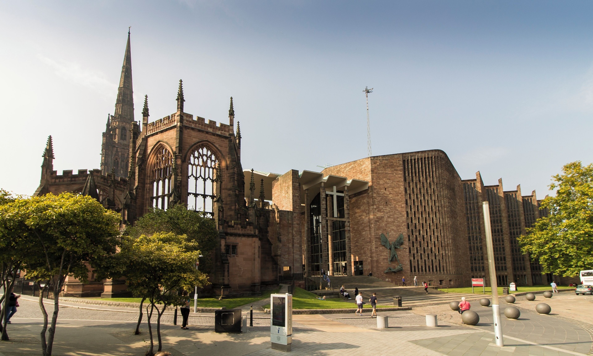 Coventry Cathedral with the ruins of the old St Michael's gothic spire beside the modern sandstone new cathedral